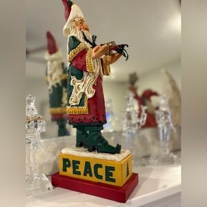 Festive Santa Figurine with Peace Sign